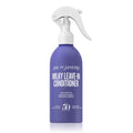 Purple bottle of Sol de Janeiro Milky Leave-In Conditioner with white spray nozzle on a white background
